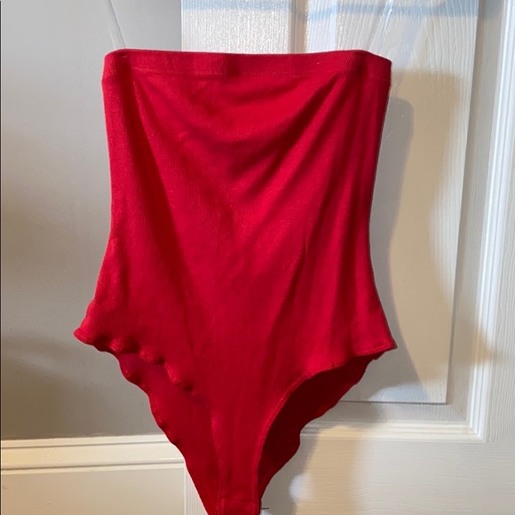 Charlotte Russe Tops - Strapless red bodysuit/onesie